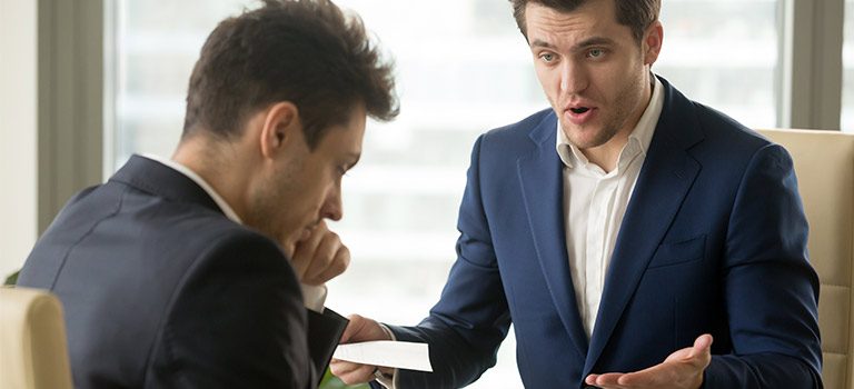 Employee Reporting boss yelling at employee business attire