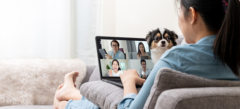 woman working remotely on computer